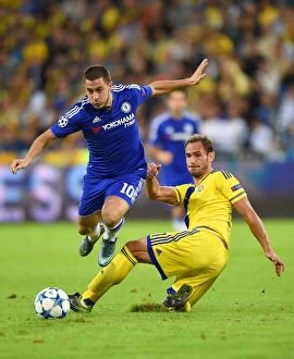 Images Dated 24th November 2015: Hazard vs. Garcia: A Champions League Showdown - Battle for Supremacy between Chelsea's Eden Hazard
