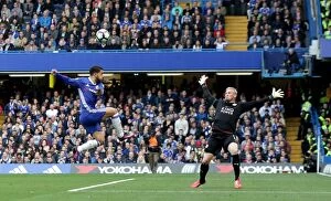 Images Dated 15th October 2016: Hazard's Dramatic Dodge: A Premier League Showdown - Schmeichel's Last-Ditch Save