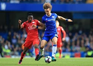 Images Dated 15th October 2016: Intense Battle for Ball Possession: David Luiz vs. Ahmed Musa - Chelsea vs