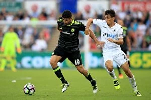 Images Dated 11th September 2016: Intense Battle for Ball Possession: Diego Costa vs Jack Cork, Swansea City vs Chelsea