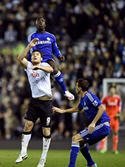 Images Dated 16th December 2014: Intense Battle for the Ball: Zouma vs. Martin - Derby County vs