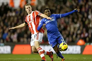 Intense Battle: Eto'o vs. Shawcross at Britannia Stadium - A Premier League Clash
