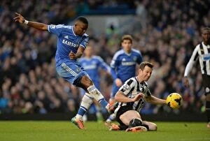 Images Dated 8th February 2014: Intense Rivalry: Eto'o vs. Williamson - Chelsea vs. Newcastle United (February 8)
