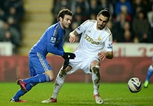 Images Dated 23rd January 2013: Intense Rivalry: Juan Mata vs. Chico - Battle for Ball in Chelsea vs