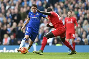 Intense Rivalry: Oscar vs Sakho's Battle for Ball Supremacy at Stamford Bridge