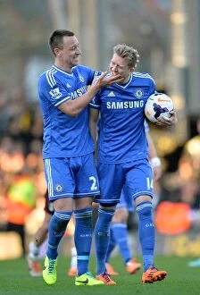 Fulham v Chelsea 1st March 2014 Collection: John Terry and Andre Schurrle: Celebrating Schurrle's Hat-Trick - Fulham vs