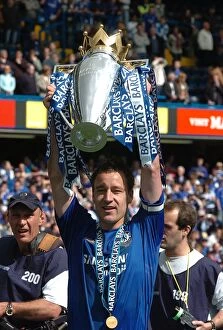 Premier League Winners 2005-2006 Collection: John Terry Lifts the Premier League Trophy: Chelsea's Triumph over Manchester United at Stamford