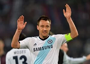 Images Dated 25th April 2013: John Terry in Thought: Chelsea's Captain Ponders After the Semi-Final Leg of the UEFA Europa