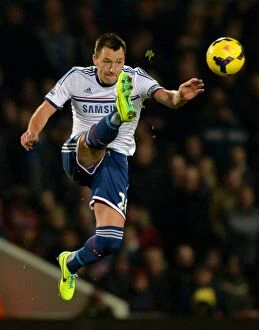 Images Dated 23rd November 2013: John Terry at Upton Park: Chelsea's Battle against West Ham United