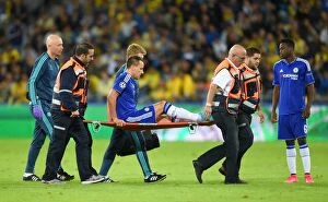 Images Dated 24th November 2015: John Terry's Injured Exit: Chelsea's Heartbreaking Moment Against Maccabi Tel Aviv in UEFA