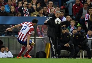 Images Dated 22nd April 2014: Jose Mourinho vs Diego Godin: A Battle of Champions League Titans - Atletico Madrid vs Chelsea