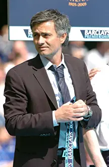 Jose Mourinho's Euphoric Moment: Celebrating Premier League Glory with Chelsea vs. Manchester United, 2005-2006 (Throwing the Trophy into the Crowd)