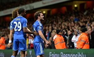 Images Dated 29th October 2013: Juan Mata's Brace: Chelsea's Capital One Cup Triumph over Arsenal at Emirates Stadium