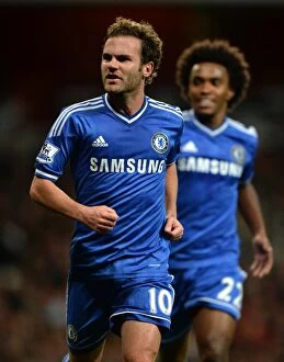 Images Dated 29th October 2013: Juan Mata's Double Strike: Chelsea's Victory Celebration vs. Arsenal in Capital One Cup