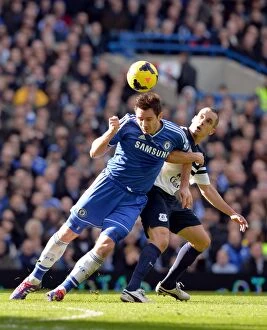 Chelsea v Everton 22nd February 2014 Collection: Lampard vs Osman: A Premier League Battle at Stamford Bridge (Chelsea vs Everton)