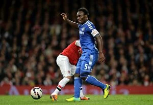 Images Dated 29th October 2013: Michael Essien's Midfield Masterclass: Chelsea Shines at Emirates Against Arsenal (Capital One Cup)