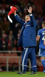 Arsenal v Chelsea 29th October 2013 Collection: Mourinho's Triumphant Salute: Honoring Ozil after Chelsea's Capital One Cup Victory at Arsenal's
