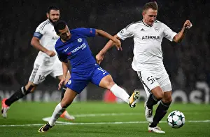 Home Prints: Pedro vs Rzezniczak: A Battle for Possession in the UEFA Champions League