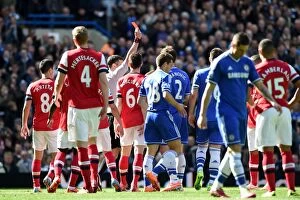 Football Chelseafcexclusive Collection: Red Card for Gibbs: Oxlade-Chamberlain Witnesses Chelsea vs. Arsenal Rivalry (22nd March 2014)