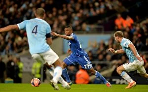 Images Dated 15th February 2014: Samuel Eto'o Avoids Confrontation with Pablo Zabaleta in Intense FA Cup Clash between Manchester