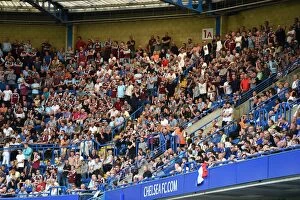 Images Dated 27th August 2016: Sea of Clarets: Burnley Fans Overwhelm Stamford Bridge