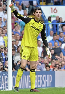 Squad 2014-2015 Season Collection: Thibaut Courtois: Unyielding Guardian at Stamford Bridge - Chelsea vs Leicester City