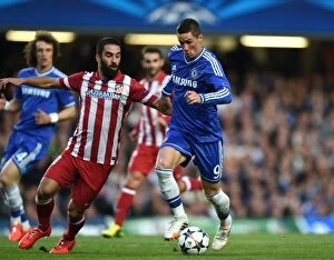 Images Dated 30th April 2014: Torres vs Turan: Battle at Stamford Bridge - Chelsea vs Atletico Madrid UCL Semi-Final Showdown