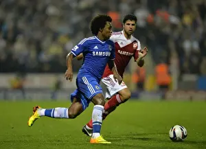 Willian in Action: Chelsea's Star Player Takes On Swindon Town in Capital One Cup Third Round