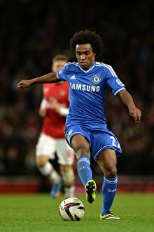 Images Dated 29th October 2013: Willian Leads Chelsea to Victory: Intense Arsenal vs. Chelsea Capital One Cup Showdown at Emirates